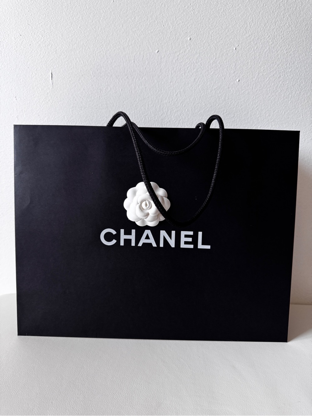 Chanel Black Paper Shopping Bag with White Camellia & Printed Ribbon ONLY